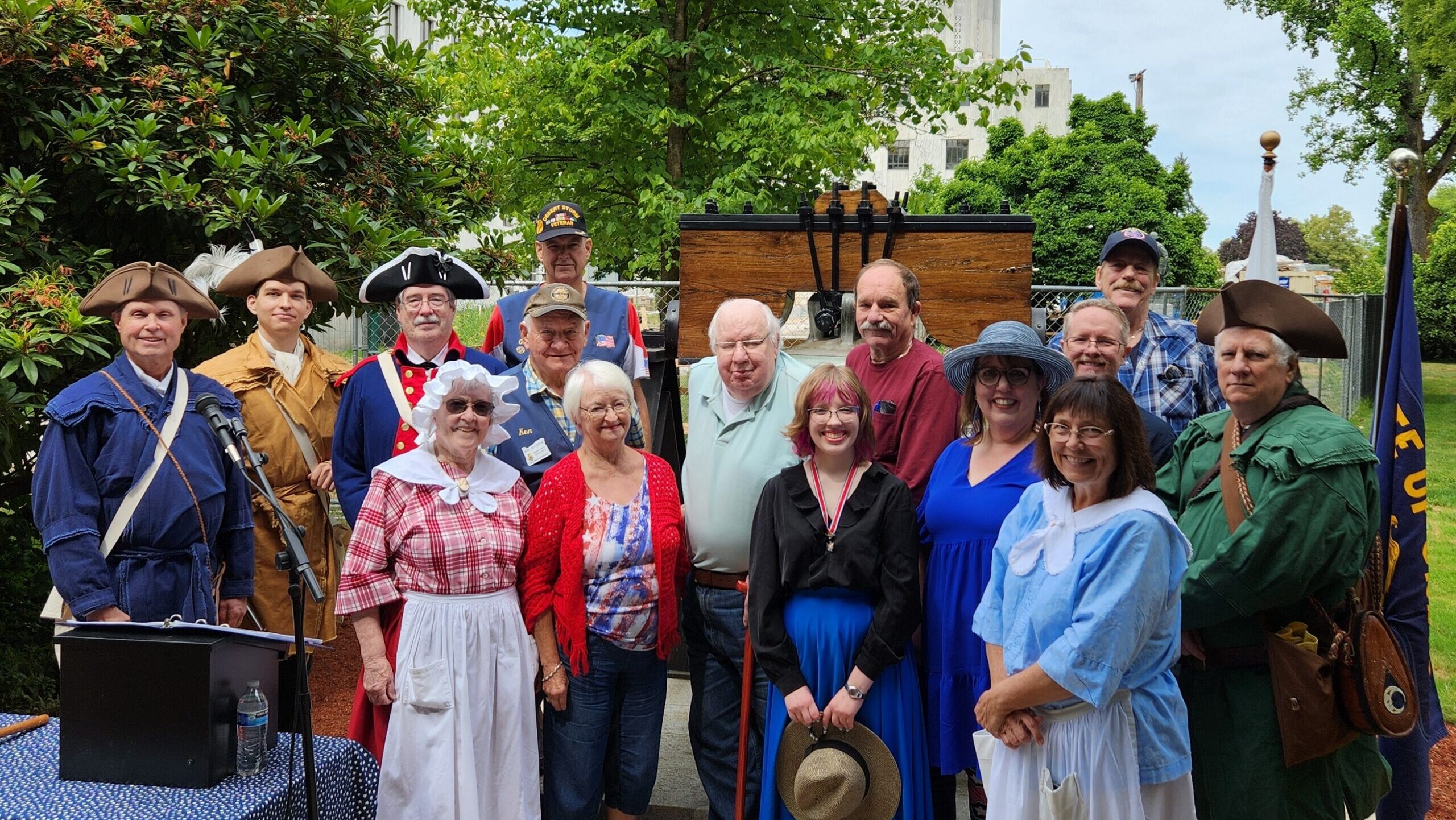 A group portrait of a cast of cultural reenactments