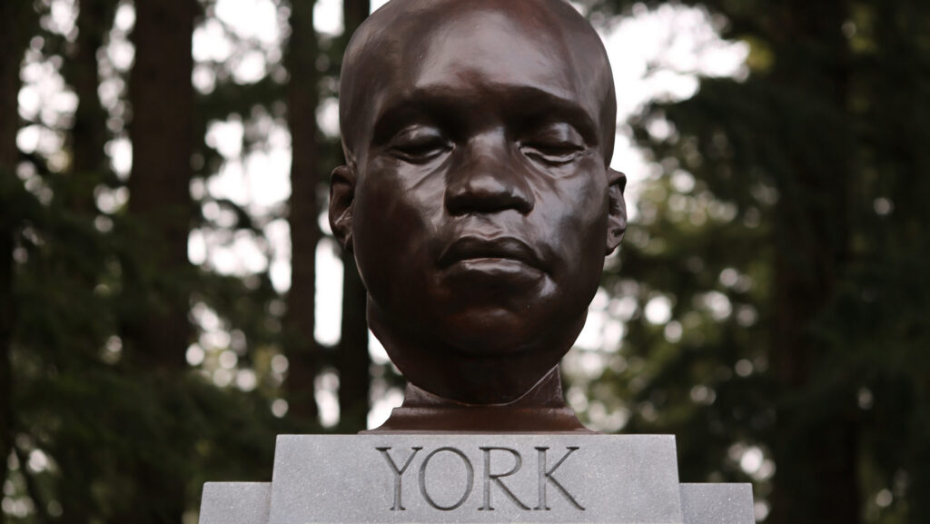 Photo of the York Memorial which is a Brass Bust with the name 'York' engraved on the pedestal